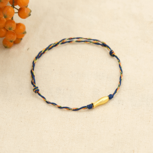 Vòng tay may mắn phối charm cá màu vàng và chỉ cotton xanh lam | vòng tay handmade | Chồi Nhỏ