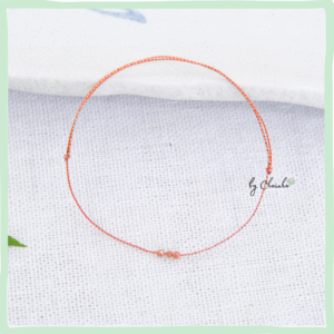 Vòng ngũ sắc phối hạt kim sa đeo chân| dây 0.5 ly đỏ phối 3 hạt kim sa nâu| freesize | Chồi Nhỏ