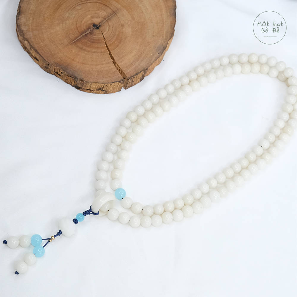 Chuỗi 108 hạt bồ đề trắng 8 ly, mix 1 hạt đá xanh dương, nhẫn trắng phối hoa sen trắng | Chồi Nhỏ | Chuỗi hạt niệm Phật bồ đề 3 Chuỗi 108 hạt bồ đề trắng 8 ly, mix 1 hạt đá xanh dương, nhẫn trắng phối hoa sen trắng | Chồi Nhỏ | Chuỗi hạt niệm Phật bồ đề - Ảnh 3